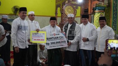 Gubernur Jambi H Al Haris Serahkan Tali Asih, Penghargaan dan Santunan Bagi PNS Purnabakti