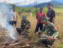 Satgas Yonif 200/BN Bersihkan Kampung Bersama Warga Wakolani