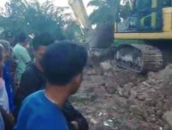 Gercep, Pj Bupati Merangin Langsung Turunkan Alat Berat Perbaiki Jalan Batang Masuma