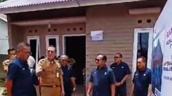 Kadis Kominfo Ariansyah Gunting Pita Bedah Rumah Bantuan PT. Semen Padang