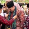 Bupati H M Syukur Disambut Secara Adat